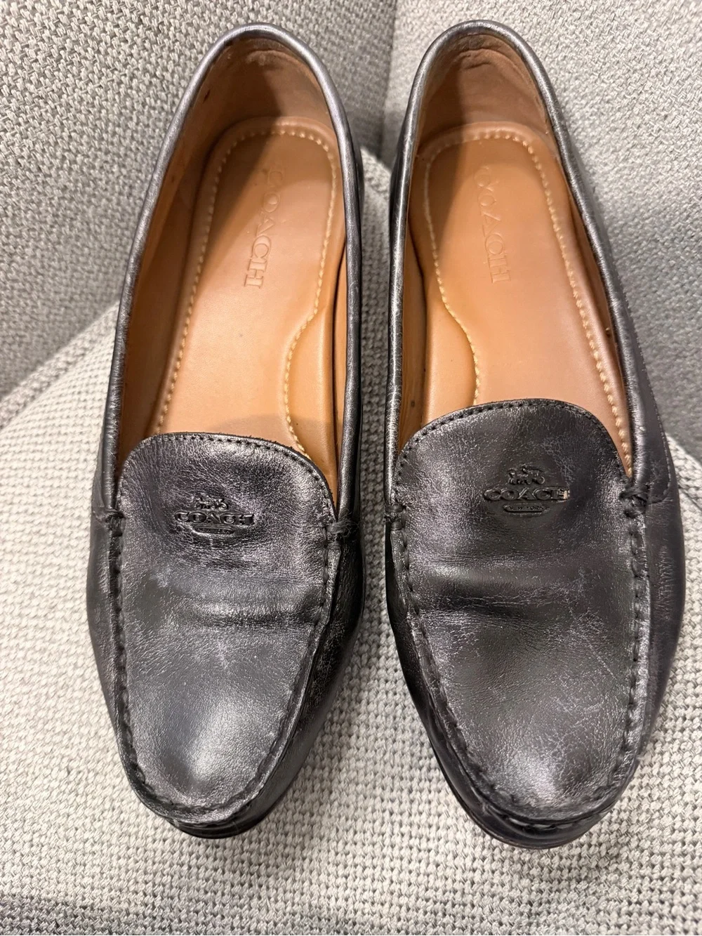 Coach women’s metallic pewter Leather Loafers